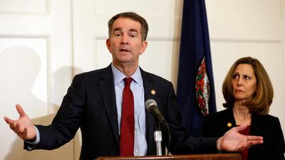 Virginia Governor Ralph Northam, with his wife, Pam, speaks during a news conference in Richmond. AP