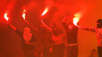 Zenit St Petersburg's fans light flares during their Russian Premier League soccer match against Terek Groznyi at the Petrovsky Stadium in St Petersburg. Alexander Demianchuk / Reuters