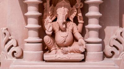 Ganesha, the elephant-headed god of wisdom and prosperity is depicted in one of the hand-carved friezes. Victor Besa / The National