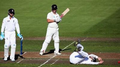 New Zealand's Hamish Rutherford looks on as Ian Bellmisses a catch at Dunedin.