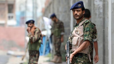 Yemeni policemen patrol the streets of the southern city of Taez on July 2, 2018. Ahmad Al Basha / AFP