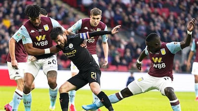 David Silva in action in the League Cup final win against Aston Villa . EPA