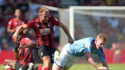 Manchester City's Kevin de Bruyne is fouled by Bournemouth's Ryan Fraser. EPA