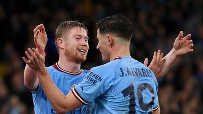 Julian Alvarez celebrates with Kevin De Bruyne after scoring the fourth goal. Getty