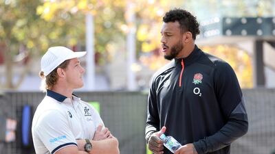 Michael Hooper talks to Courtney Lawes at a media opportunity in Perth on July 1, 2022. AFP