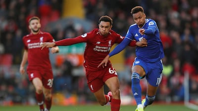 Liverpool's Trent Alexander-Arnold in action with Cardiff City's Josh Murphy. Reuters