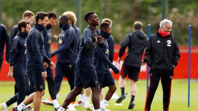 Mourinho and Pogba during training. Action Images via Reuters