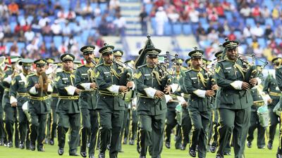 The Dubai Police band performing before the start of match between Arsenal and Al Nasr held at the Al Maktoum stadium in Dubai. Pawan Singh / The National