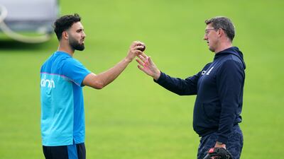 England's Saqib Mahmood with pace bowling coach Jon Lewis. PA