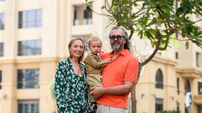 Dmytro Kotelenets, his wife Vasylisa Frolova and their son Rodion, 2, moved to the UAE in January 2022, just two weeks before the war started in Ukraine. Khushnum Bhandari / The National