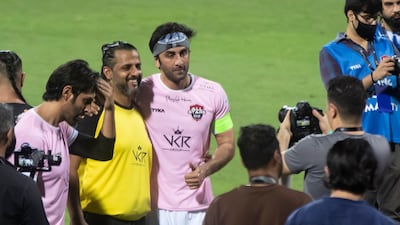 Ranbir Kapoor posing with Emirates United goalkeeper Melwyn Abraham.