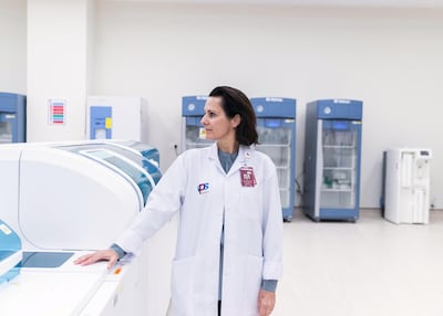 Dr Martine Mcmanus, consultant pathologist at Burjeel Medical City, is testing hundreds of samples of potential Covid-19 carriers. Reem Mohammed/The National.