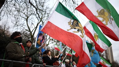 Anti-Iranian regime protesters gather outside the Iranian embassy in central London. AFP