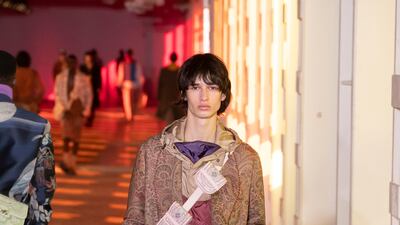 Etro teams a track top with a flowing silk robe for autumn / winter 2021. Courtesy Etro