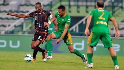 Dibba Al Fujairah (green) v Ajman (black) at Fujairah Stadium on 16.12.2012, (Al Ittihad)