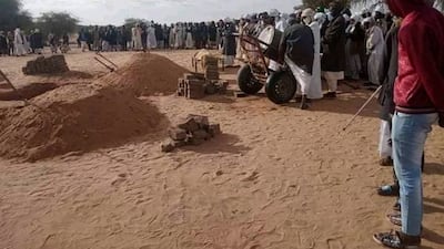 People attend the funerals of victims of a gold mine collapse in Sudan's West Kordofan state, last year. Another mine collapsed on Thursday. AP