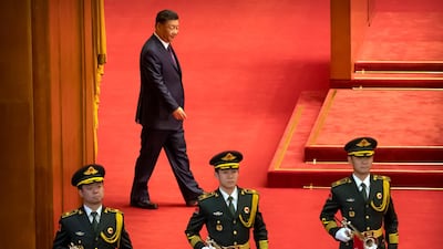 Chinese President Xi Jinping arrives for an event to honour some of those involved in China's fight against Covid-19 at the Great Hall of the People in Beijing, on Tuesday, September 8, 2020. AP