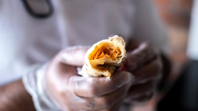 Chips Oman paratha goes for Dh3 at Abdulla Omar Cafeteria. Reem Mohammed / The National