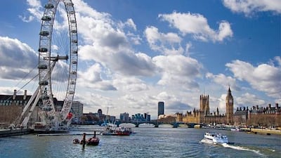 London, as viewed looking down the Thames from Charing Cross Bridge. The London Eye is pictured on the left, with the Houses of Parliament, the seat of the British government, seen on the right. Getty Images