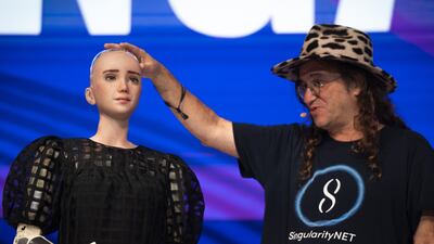 Sophia AI, a human-like robot, and Dr Ben Goertzel, chief scientist at Hanson Robotics, have a conversation at an event in Singapore last month. Bloomberg