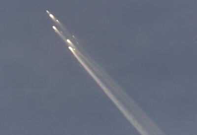 Pieces of the Mir space station streaked across the sky above Fiji as it burned up in the earth's atmosphere on March 23, 2001. Reuters