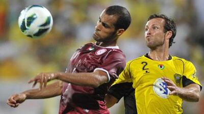 Taller than many of his Emirati compatriots, Saeed Al Kathiri, left, is not only dangerous with the high ball but 'he's quite lethal with his shots,' says Branko Ivankovic, his coach at Al Wahda.