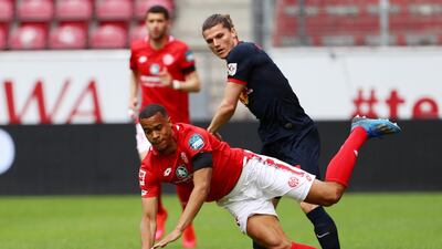 RB Leipzig's Marcel Sabitzer in action with Mainz's Robin Quaison. Reuters