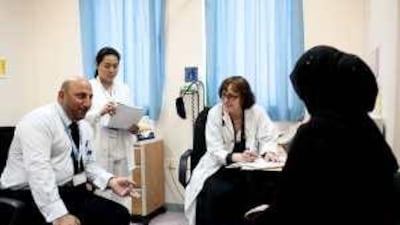 Badi Kanaan, left, translates for Dr Irena Khostanteen, the head of rheumatology.