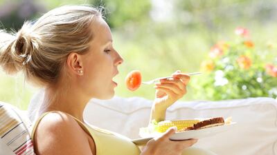 During your pregnancy, ensure you eat a balanced, nutritious diet. Peter Cade / Getty Images