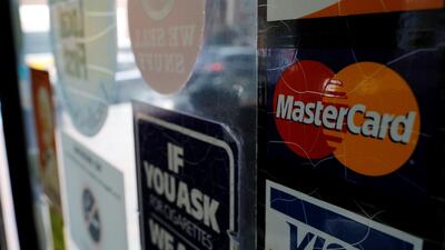 MasterCard and Visa both saw earnings rise. Reuters