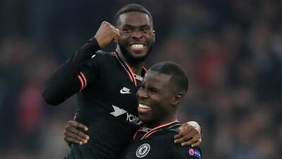 Chelsea central defenders Kurt Zouma, right and Fikayo Tomori celebrate at the end of the game. AP Photo