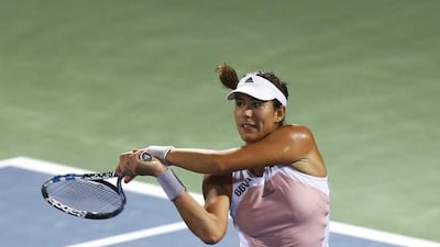 Garbine Muguruza of Spain fires a return to her best friend and compatriot Carla Suarez Navarro during their quarter-final match on Thursday. Muguruza, the world No 24, won in three sets. Francois Nel / Getty Images