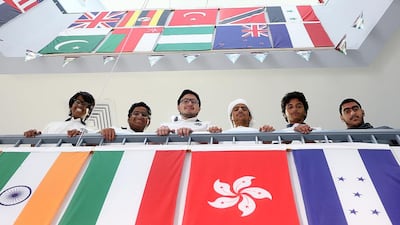 Carrying the UAE’s message are, from left, Khalifa Al Suwaidi, Obaid Al Suwaidi, Alfred Diba, Ali Al Shamsi, Ali Al Rumaithi, and Ahmed Al Khouri. Satish Kumar / The National