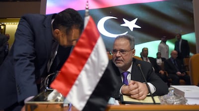 Yemeni Foreign Minister Abdul Malek Al-Mekhlafi, speaks to an aid, during the preparatory meeting of Arab Foreign Ministers ahead of the 28th Summit of the Arab League in Riyadh. Fayez Nureldine / AFP Photo