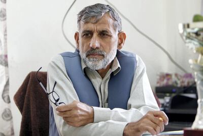 Hazrat Younas, principal of a government school in Ahingaro Dherai village, said UAE-funded schools had helped increase pupil enrollment. Aamir Saeed / The National