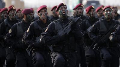 Members of Saudi security forces take part in a military parade. Muhammad Hamed / Reuters