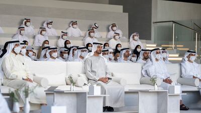 Sheikh Mohamed bin Zayed, centre, with, front row from left, Sheikh Abdullah bin Rashid Al Mu'alla, Deputy Ruler of Umm Al Quwain, Sheikh Saif bin Zayed and Sheikh Khaled bin Zayed.