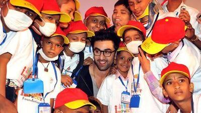 The actor Ranbir Kapoor, centre, with children at the Tata Memorial Hospital in Mumbai. AFP