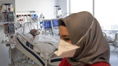 A medic tends to a Covid-19 patient at the Ankara City Hospital's intensive care unit on October 5, 2020, in the Turkish capital. Getty