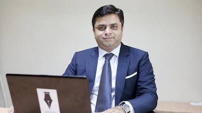 Deepak Gurnani, an estate Planner with Just Legal Consultancy in Dubai says he has more than a dozen suits costing between $700 to $1,000 each, which he considers a worthwhile investment for his career. Pawan Singh / The National