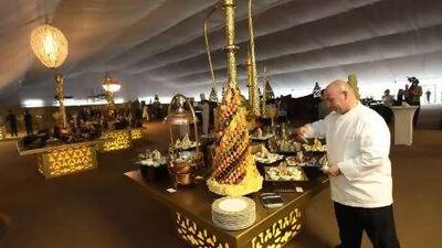 A chef prepares one of the several delicacies that will be served during iftar in a Ramadan tent at the Atlantis hotel.