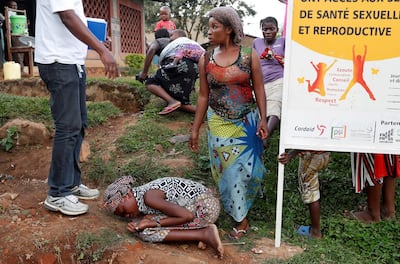 The mother of a child suspected of dying from Ebola cries outside a hospital in North Kivu. Goran Tomasevic / Reuters