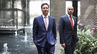 Muhannad M Qubaj, Gulf Capital managing director, and the company's CEO, Karim El Solh (left). Lee Hoagland / The National