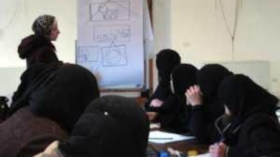 Young Syrian women prepare for marriage by attending a bride school in Aleppo.