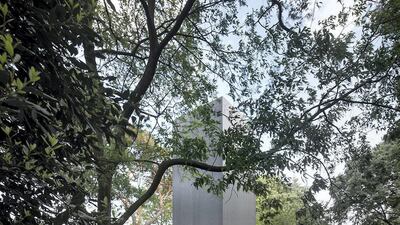 Through another grove of trees, is a chapel designed and constructed by Sean Godsell of Melbourne Australia. Atop a metal altar, Godsell placed an empty upright metal rectangle with the dimensions of a shipping container.