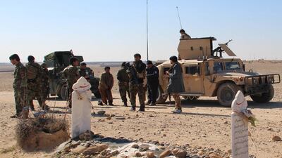 Afghan security officials patrol in Helmand, Afghanistan. EPA