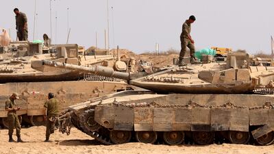 Israeli troops posted at the border with the Gaza Strip, on August 13, 2025. AFP