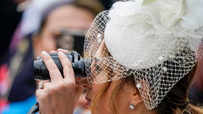 Racegoers wait for Queen Elizabeth II on day five of the Royal Ascot meet at Ascot Racecourse. Getty Images