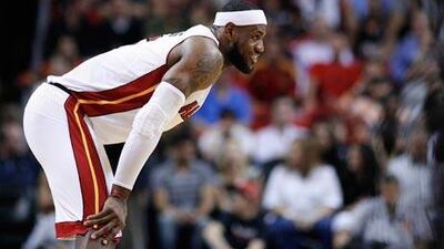 Miami Heat's LeBron James awaits the opening tipoff against the Memphis Grizzlies.