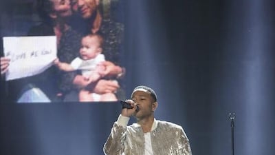 John Legend performs Love Me Now at the American Music Awards. Matt Sayles / Invision / AP